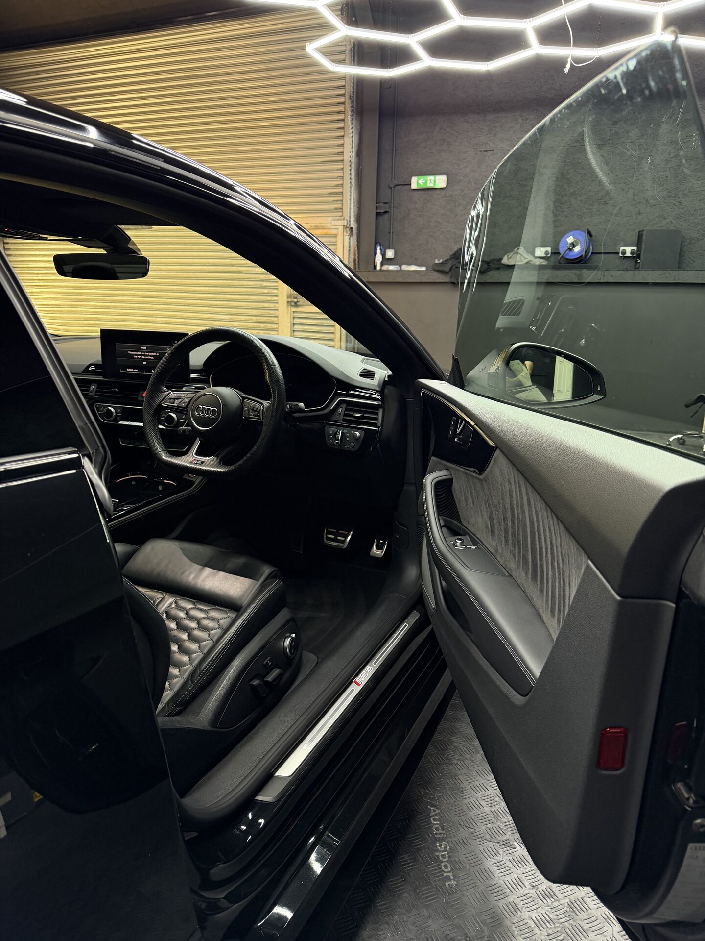 SB Detailers owner inside the Leighton Buzzard detailing unit